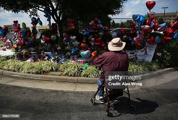 Former employee Paul Lancaster remembers his friend Alison Parker at a make shift memorial outside WDBJ September 1, 2015 in Roanoke, Virginia....