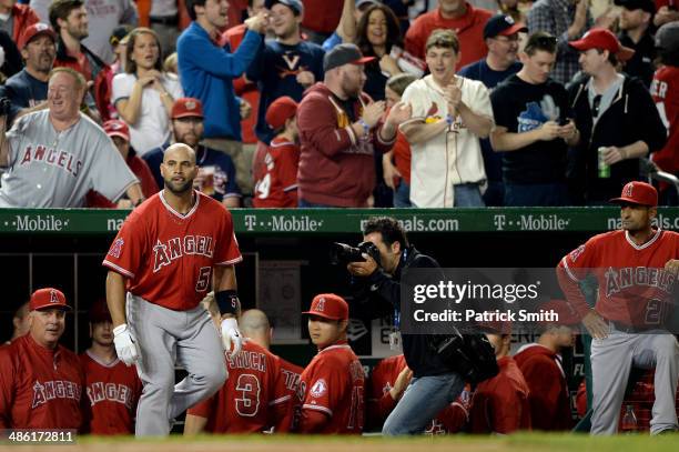 Los Angeles Angels of Anaheim team photographer, Matt Brown, photographs Albert Pujols of the Los Angeles Angels of Anaheim acknowledges the crowd...