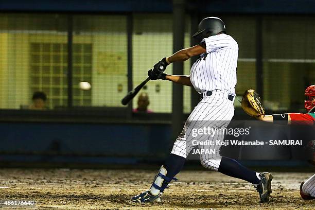 Outfielder Louis Okoye hits a RBI double in the bottom half of the fourth inning in the first round game between Japan v Mexico during the 2015 WBSC...