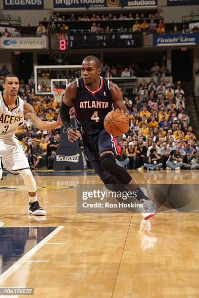 Paul Millsap of the Atlanta Hawks drives to the basket against the Indiana Pacers in the East Conference Quarter Finals Game Two at Bankers Life...