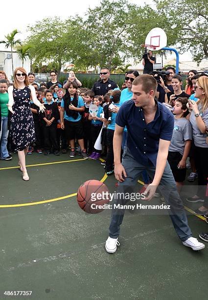 Andrew Garfield and Emma Stone participates in Be Amazing 2014 Miami at Hialeah Gardens Elementary on April 22, 2014 in Hialeah, Florida.