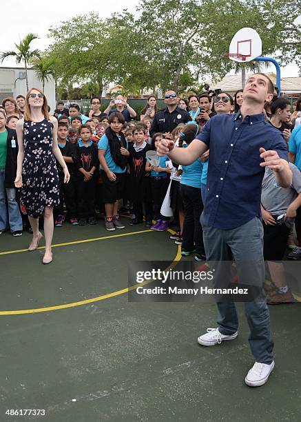 Andrew Garfield and Emma Stone participates in Be Amazing 2014 Miami at Hialeah Gardens Elementary on April 22, 2014 in Hialeah, Florida.