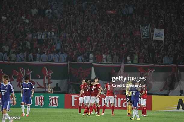 Players of Guangzhou Evergrande celebrate after winning the AFC Asian Champions League match between Guangzhou Evergrande and Yokohama F. Marinos at...