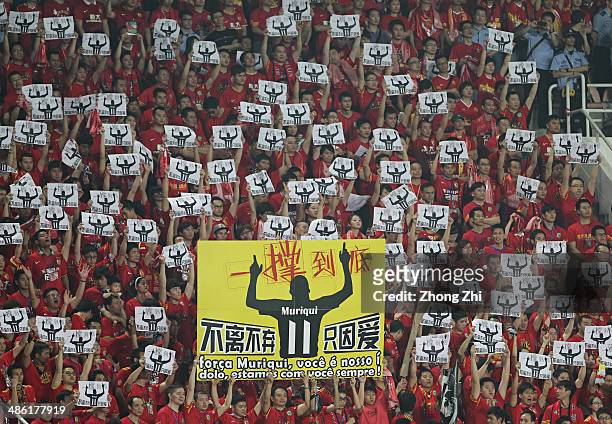 Supporters of Luiz Muriqui of Guangzhou Evergrande hold posters during the AFC Asian Champions League match between Guangzhou Evergrande and Yokohama...