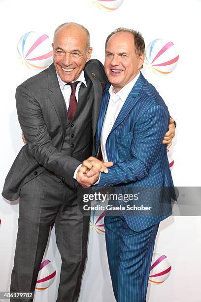 Heiner Lauterbach and Uwe Ochsenknecht during the premiere of the film 'Die Udo Honig Story' at Gloria Palast in Munich on September 1, 2015 in...