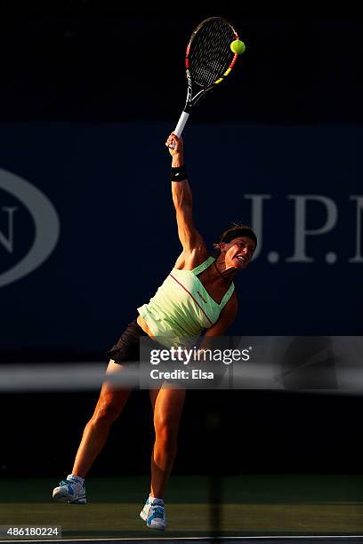 Lourdes Dominguez Lino of Spain serves against Nicole Gibbs of the United States during their Women's Singles First Round match on Day Two of the...