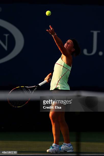 Lourdes Dominguez Lino of Spain serves against Nicole Gibbs of the United States during their Women's Singles First Round match on Day Two of the...