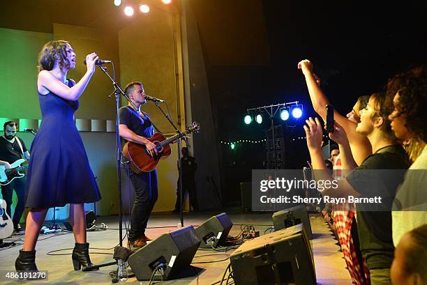 Amanda Sudano and Abner Ramirez of Johnnyswim perform at the Levitt Pavilion in Los Angeles, California stage on July 30, 2015.