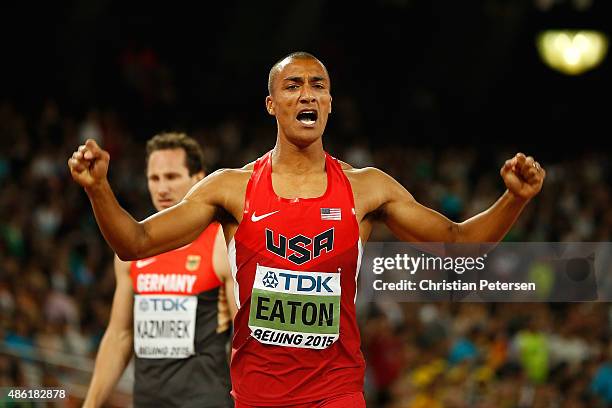 Ashton Eaton of the United States crosses the finish line to win his Men's Decathlon 400 metres heat to lead the overall Decathlon during day seven...