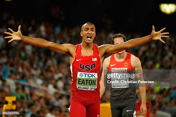 Ashton Eaton of the United States crosses the finish line to win his Men's Decathlon 400 metres heat to lead the overall Decathlon during day seven...