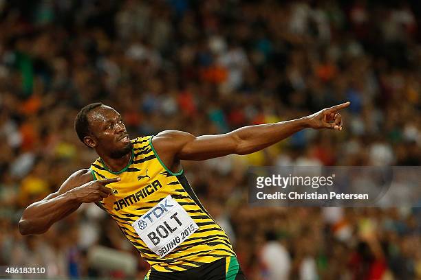 Usain Bolt of Jamaica celebrates after winning gold in the Men's 100 metres final during day two of the 15th IAAF World Athletics Championships...