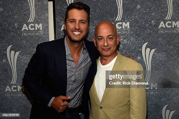 Luke Bryan and CBS Entertainment's Jack Sussman pose backstage during the 9th Annual ACM Honors at the Ryman Auditorium on September 1, 2015 in...