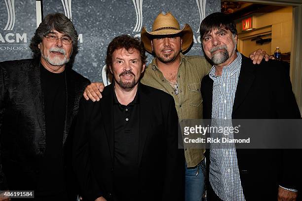 Alabama's Randy Owen and Jeff Cook, Jason Aldean, and Alabama's Teddy Gentry pose backstage during the 9th Annual ACM Honors at the Ryman Auditorium...