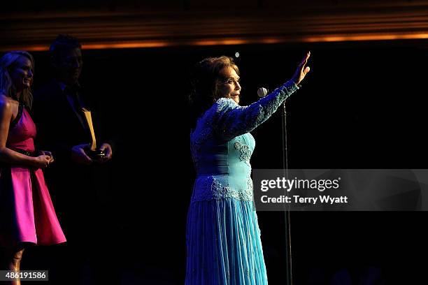 Loretta Lynn accepts the Crystal Milestone Award during the 9th Annual ACM Honors at the Ryman Auditorium on September 1, 2015 in Nashville,...