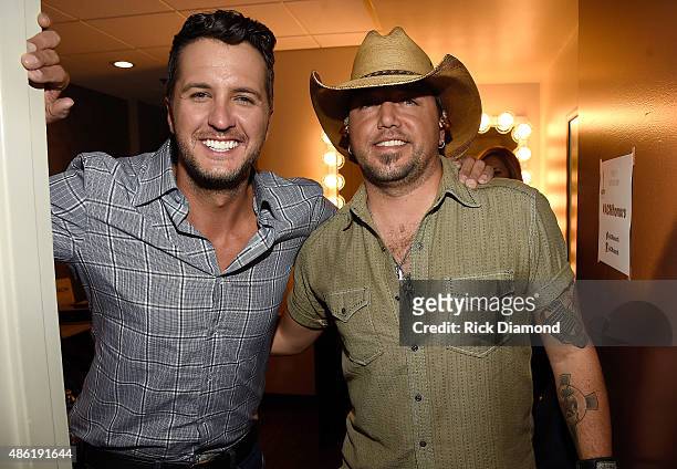 Luke Bryan and Jason Aldean pose backstage during the 9th Annual ACM Honors at the Ryman Auditorium on September 1, 2015 in Nashville, Tennessee.