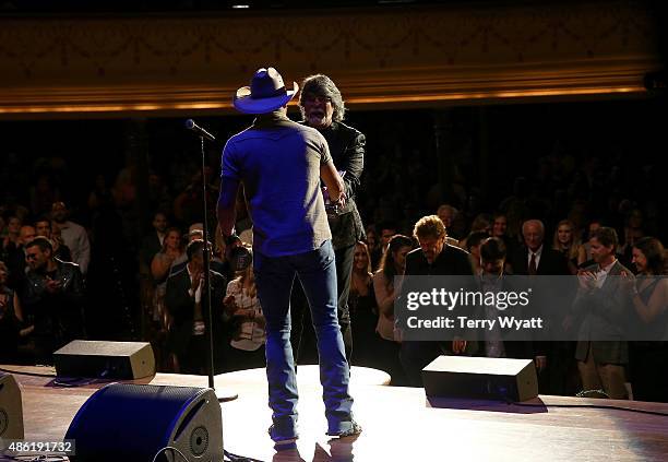 Jason Aldean and Randy Owen onstage during the 9th Annual ACM Honors at the Ryman Auditorium on September 1, 2015 in Nashville, Tennessee.