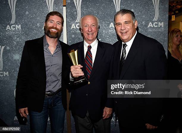 Josh Turner, Poet's Award recipient Bob McDill, and ACM CEO Bob Romeo pose backstage during the 9th Annual ACM Honors at the Ryman Auditorium on...