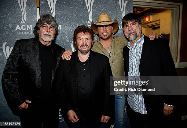 Alabama's Randy Owen and Jeff Cook, Jason Aldean, and Alabama's Teddy Gentry pose backstage during the 9th Annual ACM Honors at the Ryman Auditorium...