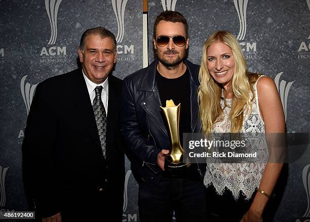 Bob Romeo, Jim Reeves International Award winner Eric Church, and Holly Williams pose backstage during the 9th Annual ACM Honors at the Ryman...