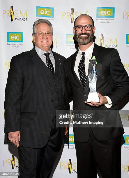 President & CEO, Entertainment Industries Council Brian Dyak presents the EIC President's Award to comedian Brody Stevens at the 18th Annual PRISM...