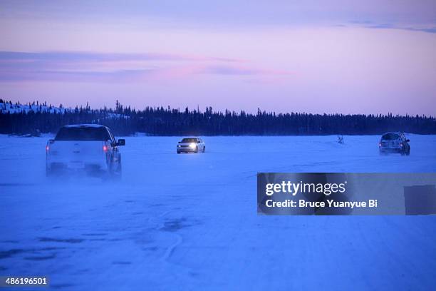 evening rush hour traffic on great slave lake - great slave lake stock pictures, royalty-free photos & images