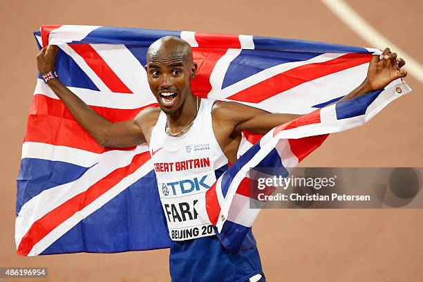 Mohamed Farah of Great Britain reacts after winning gold in the Men's 10000 metres final during day one of the 15th IAAF World Athletics...