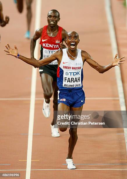 Mohamed Farah of Great Britain reacts after winning gold in the Men's 10000 metres final during day one of the 15th IAAF World Athletics...
