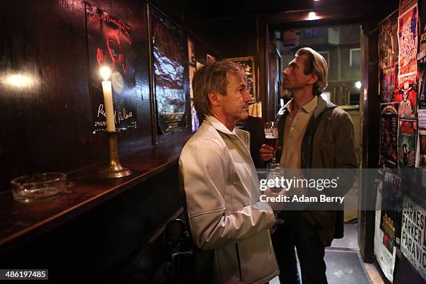 Patrons have drinks at the Alt Berlin bar on April 22, 2014 in Berlin, Germany. The bar, which opened in 1893 and is known for its familial...