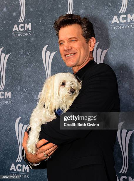 Chris Isaak and his dog Rodney attend the 9th Annual ACM Honors at Ryman Auditorium on September 1, 2015 in Nashville, Tennessee.