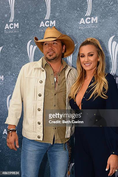 Jason Aldean and his wife Brittany Kerr attend the 9th annual ACM Honors at Ryman Auditorium on September 1, 2015 in Nashville, Tennessee.