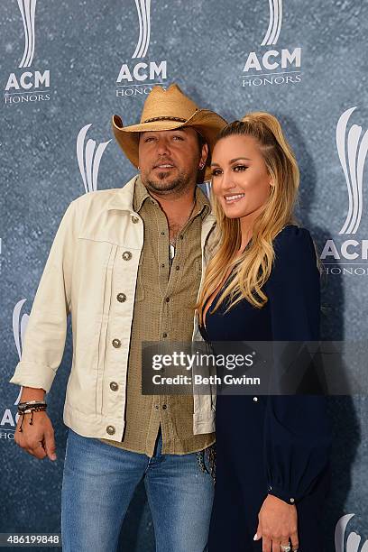 Jason Aldean and his wife Brittany Kerr attend the 9th Annual ACM Honors at Ryman Auditorium on September 1, 2015 in Nashville, Tennessee.