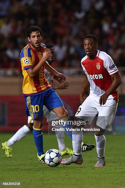 Anthony Martial of Monaco in action against Daniel Parejo of Valencia during the UEFA Champions League qualifying round play off second leg match...