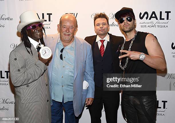 Rapper Flavor Flav, television host and writer Robin Leach, producer Wade Martin and illusionist Criss Angel attend Martin's premiere of music videos...