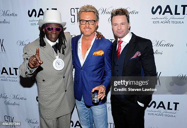 Rapper Flavor Flav, entertainer Chris Phillips and producer Wade Martin attend Martin's premiere of music videos by Flavor Flav and Coolio, the first...