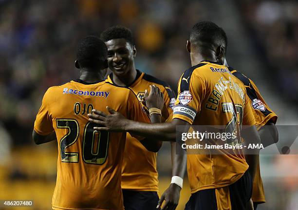 Sheyi Ojo of Wolverhampton Wanderers celebrates with his team-mates after scoring a goal to make it 2-0during the Capital One Cup match between...