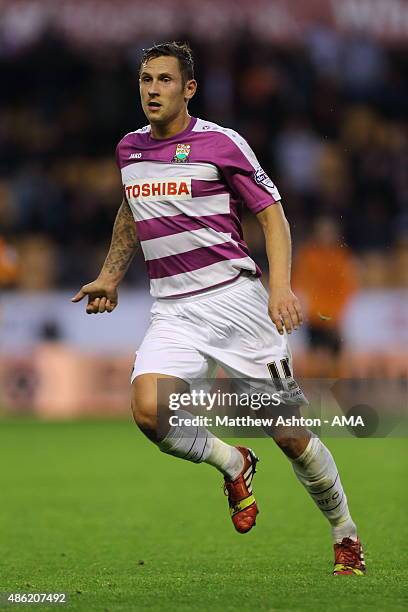 Ben Tomlinson of Barnet during the Capital One Cup match between Wolverhampton Wanderers and Barnet at Molineux on August 25, 2015 in Wolverhampton,...