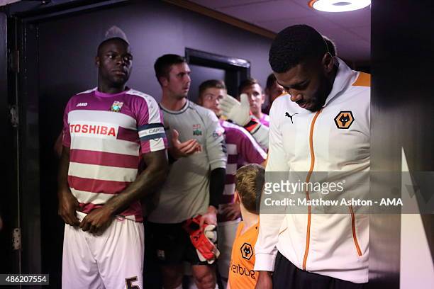 The players wait in the tunnel prior to kick off at Molineux Stadium home of Wolverhampton Wanderers during the Capital One Cup match between...
