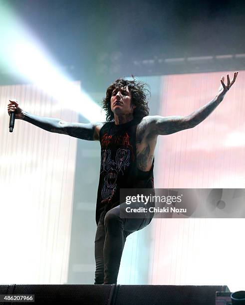 Oliver Sykes of Bring Me The Horizon performs on Day 2 of the Reading Festival at Richfield Avenue on August 29, 2015 in Reading, England.