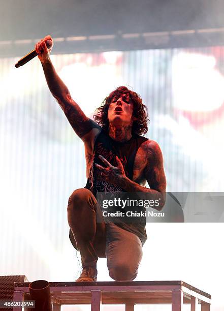 Oliver Sykes of Bring Me The Horizon performs on Day 2 of the Reading Festival at Richfield Avenue on August 29, 2015 in Reading, England.