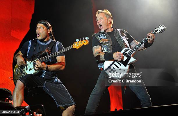 Robert Trujillo and James Hetfield of Metallica headline on the Main Stage during the 2nd Day of the Reading Festival at Richfield Avenue on August...
