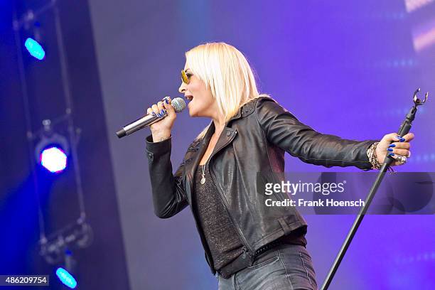 German singer Sarah Connor performs live during The Stars For Free 2015 concert at the Kindlbuehne Wuhlheide on August 29, 2015 in Berlin, Germany.