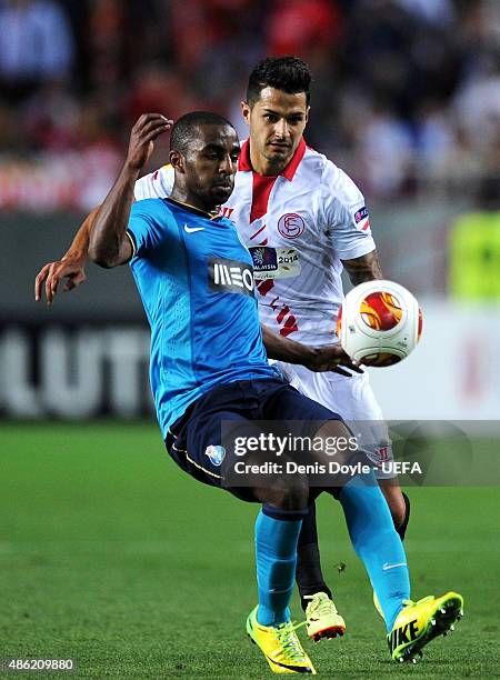 Eliaquim Mangala of FC Porto holds off Vitolo of Sevilla FC during the UEFA Europa League Quarter Final match between Sevilla FC and FC Porto at...