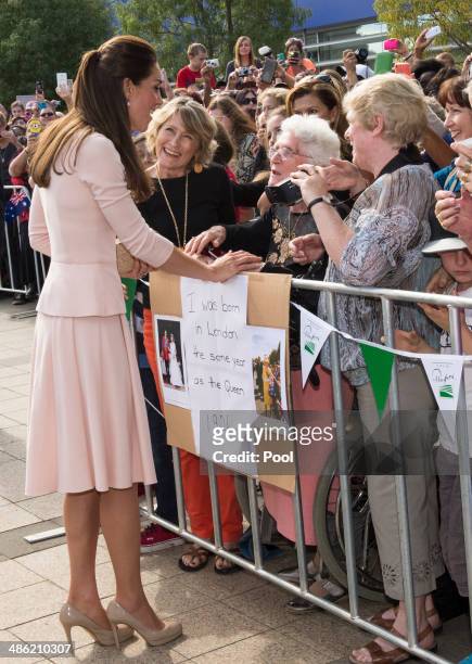 Catherine, Duchess of Cambridge greets members of the crowd at the Playford Civic Centre in the Adelaide suburb of Elizabeth on April 23, 2014 in...