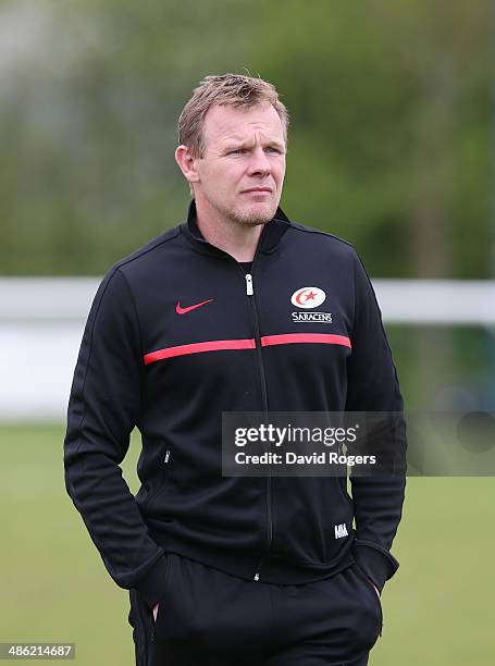 Mark McCall the Saracens director of rugby looks on during the Saracens training session held at the Saracens media day held at their training ground...