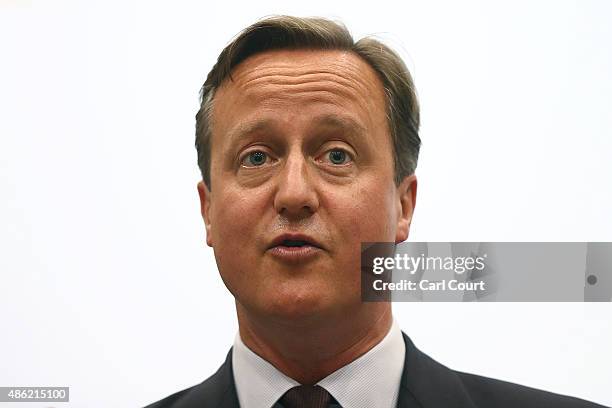 Prime Minister David Cameron addresses pupils at an assembly during a visit to Corby Technical School on September 2, 2015 in Corby, England. Mr...