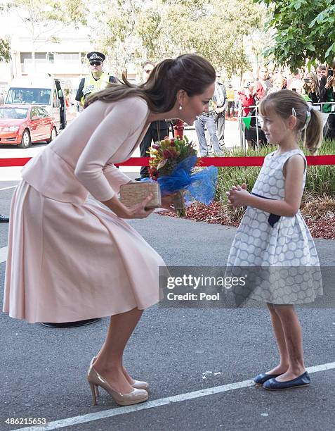 Catherine, Duchess of Cambridge meets six year old Lauren Stepherson during their visit to Elizabeth on April 23, 2014 in Adelaide, Australia. The...