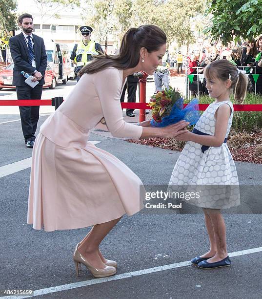 Catherine, Duchess of Cambridge meets six year old Lauren Stepherson during their visit to Elizabeth on April 23, 2014 in Adelaide, Australia. The...