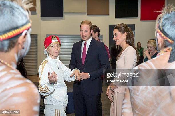 Catherine, Duchess of Cambridge and Prince William, Duke of Cambridge speak to performers at the youth community centre, The Northern Sound System,...