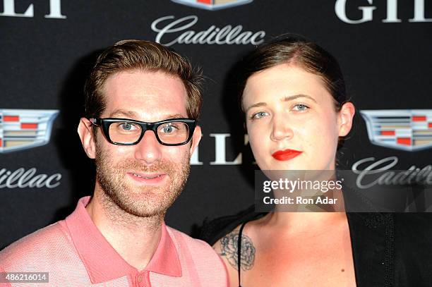 Designer David Hart and Shelby Christensen attend the Cadillac Capsule Clothing Collection Launch at Classic Car Club on September 1, 2015 in New...