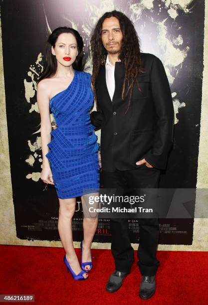 James Shaffer aka Munky of the band KORN and Evis Xheneti arrive at the Los Angeles Premiere of "The Quiet Ones" held at The Theatre at Ace Hotel on...